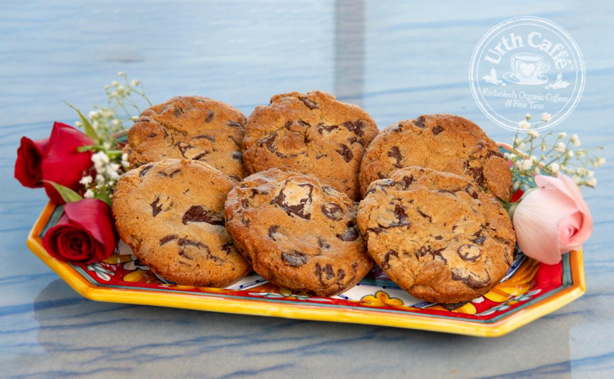 Urth Caffé Love Chocolate Chip cookies on a hand painted decorative platter with roses on either side. 