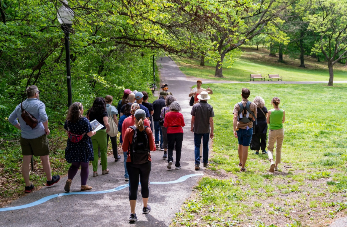People walking in a park on a ghost river tour