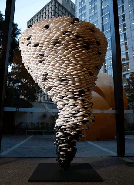 "storm brewing" artwork using recycled materials