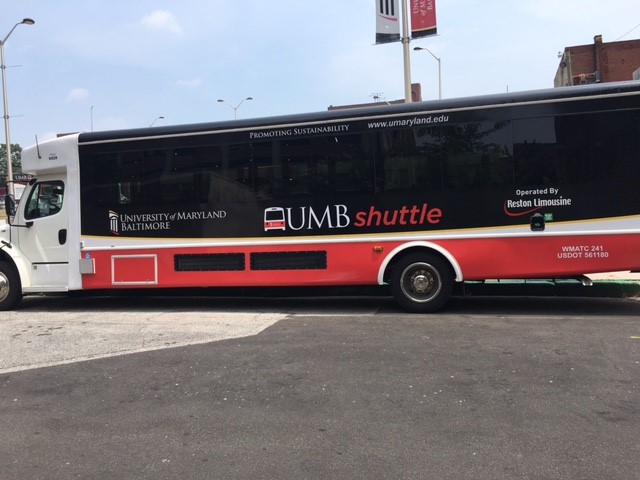 Image of the side of a UMB shuttle bus.