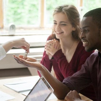 Young_Couple_Buying_Home_AdobeStock_175715068.jpg
