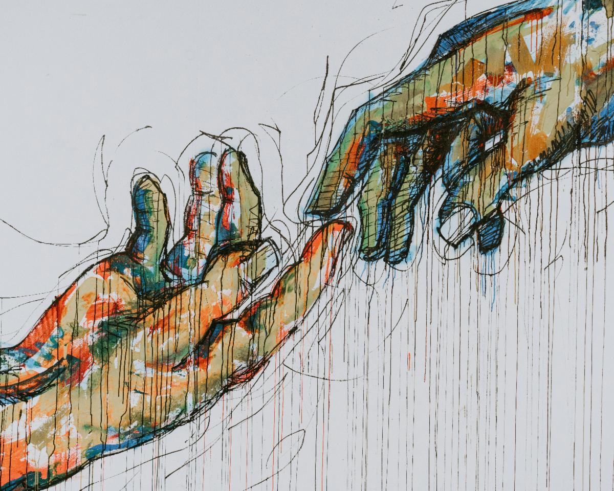 One hand reaching up to another