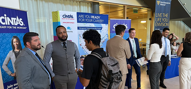 Students talk to employers in the Rotunda