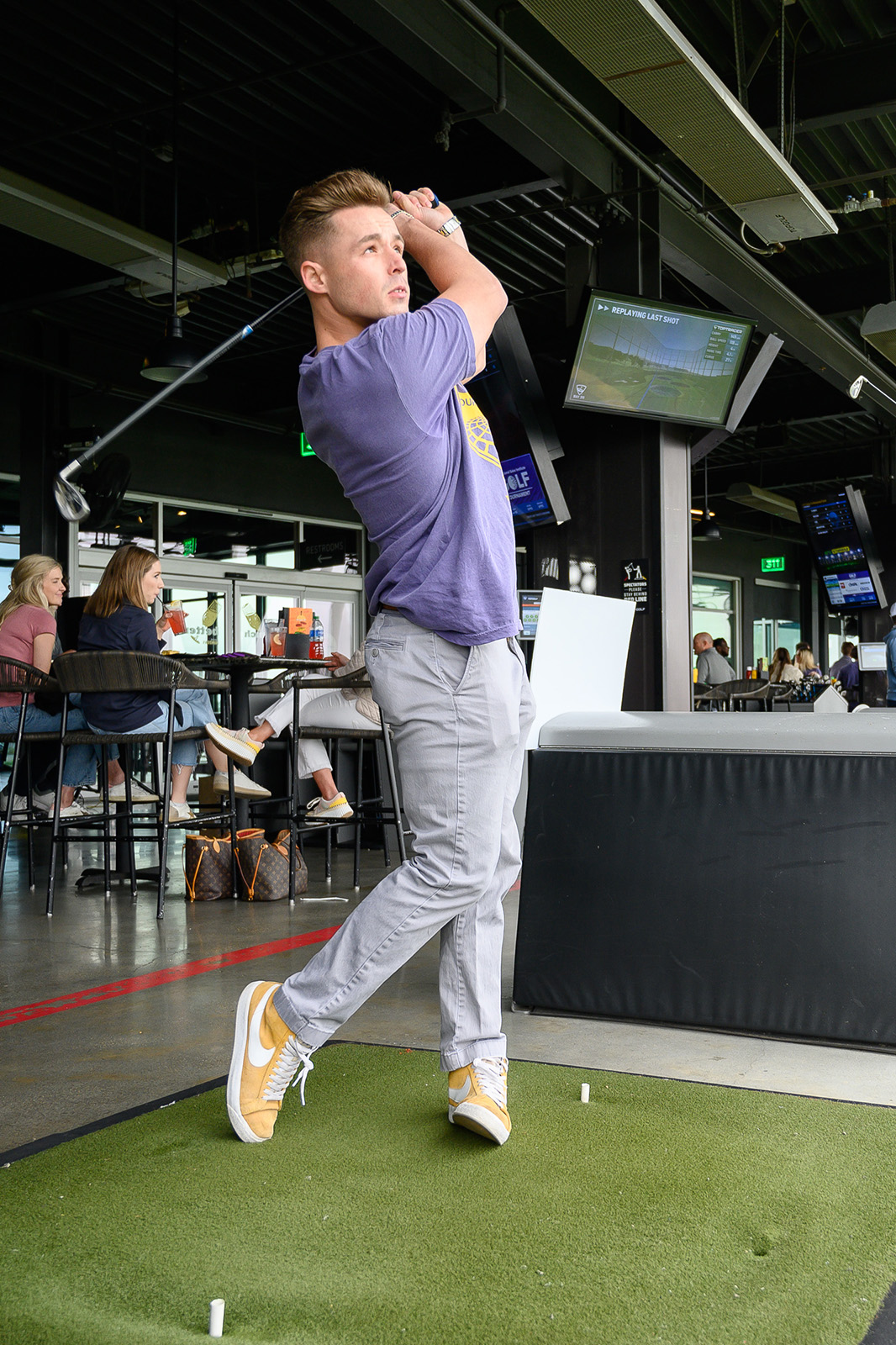 Student playing top golf during the 2023 PSI tournament