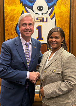 Brandi Bush Roberts with President Rousse