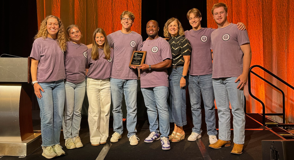 BAP group photo holding their international award