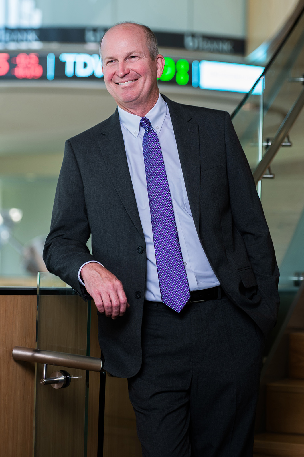 An image of Dean Russell Crook in the rotunda lobby of the LSU Business Education Complex
