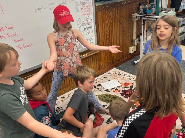 students in Spanish class play a game