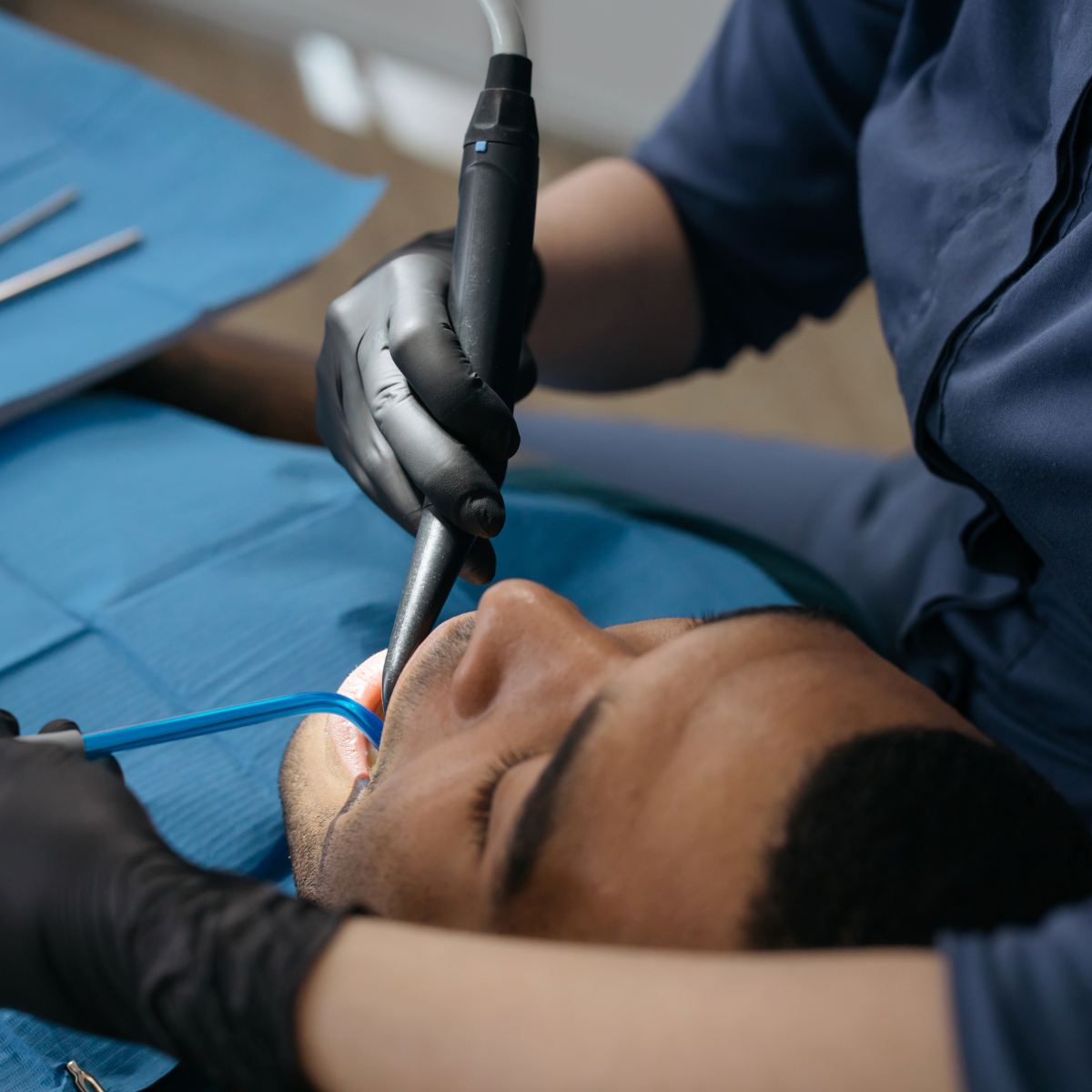 Man receiving dental care.