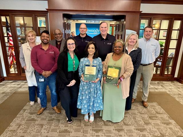 Dunwoody Finance team poses with awards