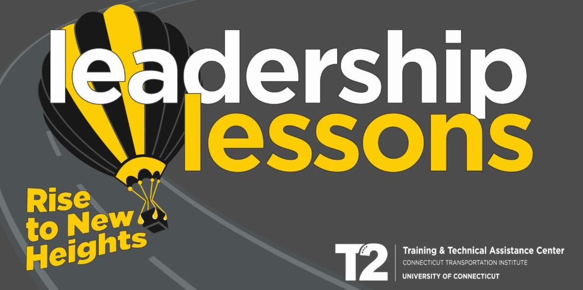 Graphic with a dark gray background featuring a black and yellow hot air balloon. The large white and yellow text reads Leadership Lessons. Below the balloon yellow text says Rise to New Heights. The bottom right corner includes the T2 Center
