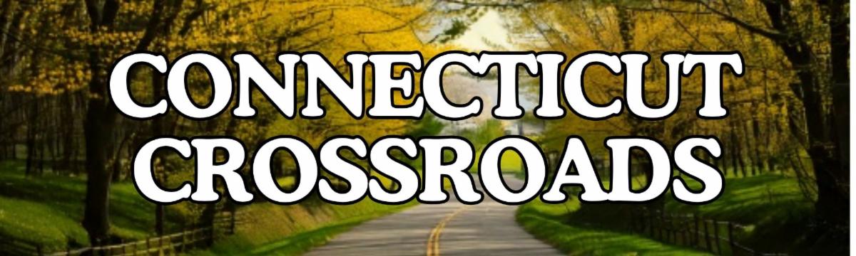 A scenic, tree-lined road in Connecticut during autumn, with yellow and green foliage arching over the roadway. Large bold white text with a black outline centered over the image reads CONNECTICUT CROSSROADS.