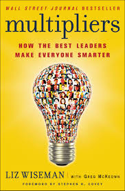 Book cover for Multipliers How the Best Leaders Make Everyone Smarter by Liz Wiseman with Greg McKeown featuring a yellow background and a lightbulb filled with photos of diverse faces