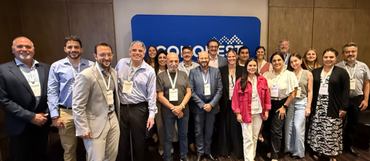 Picture of CONQUEST team posing with physicians in Argentina.