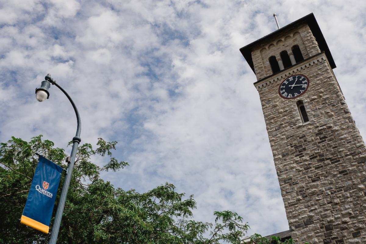 Grant Hall looking up on cloudy day