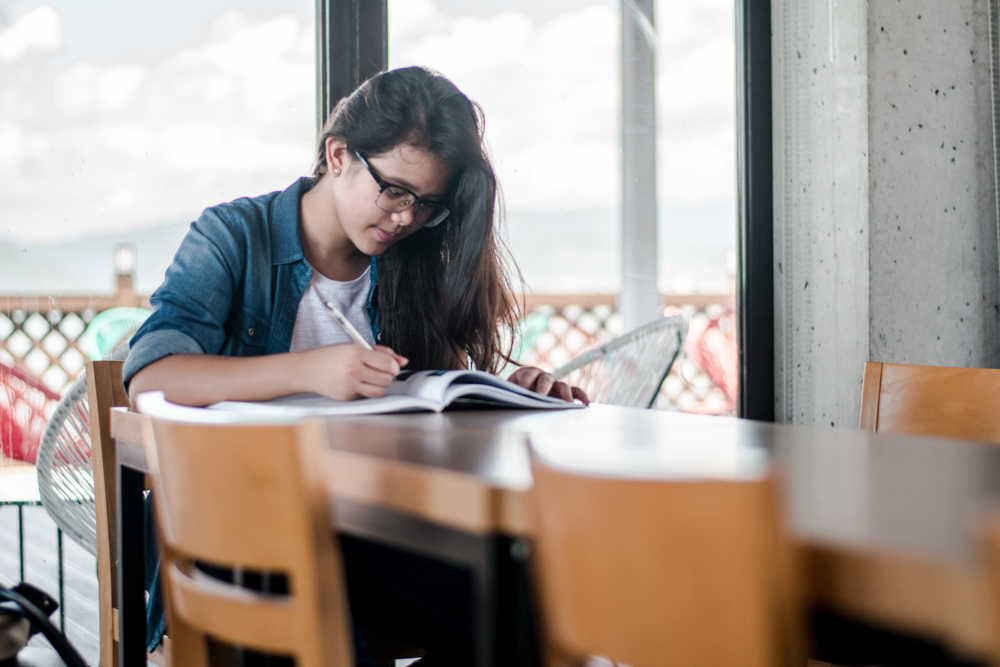 Student studying at table