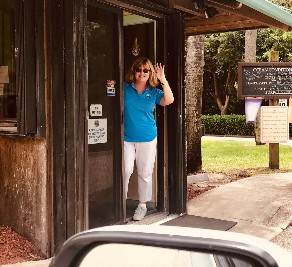 Beach Park Gate Attendant waving