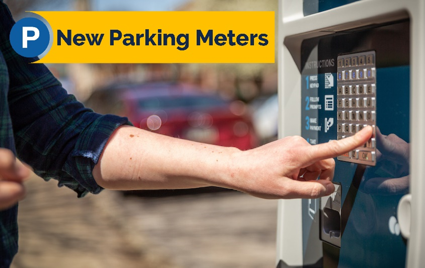 New parking meters. woman using parking meter in boca raton