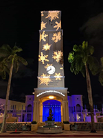 holiday lights on clock tower at mizner park amphitheater