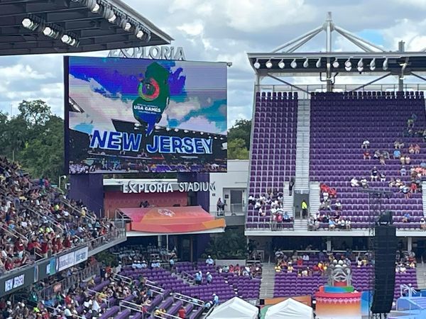 Special Olympics USA Games stadium shot with NJ displayed on the giant screen