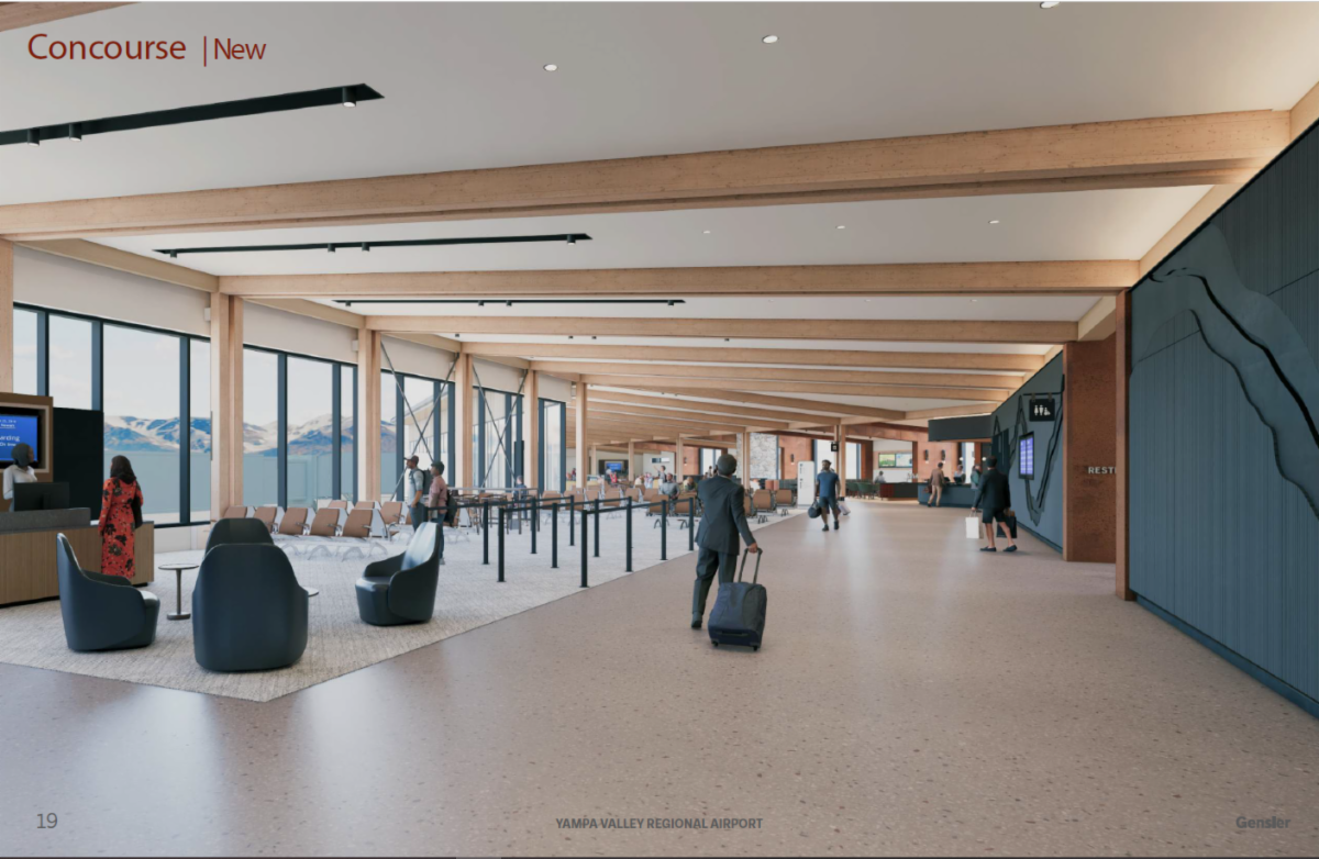 Modern airport concourse at Yampa Valley Regional Airport with large windows offering mountain views, wooden ceiling beams, and light-colored flooring. The space includes seating areas, people walking or sitting.