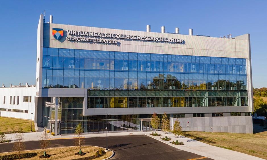 Exterior view of the Virtua Health College Research Center at Rowan University, a modern, multi-story glass research building.