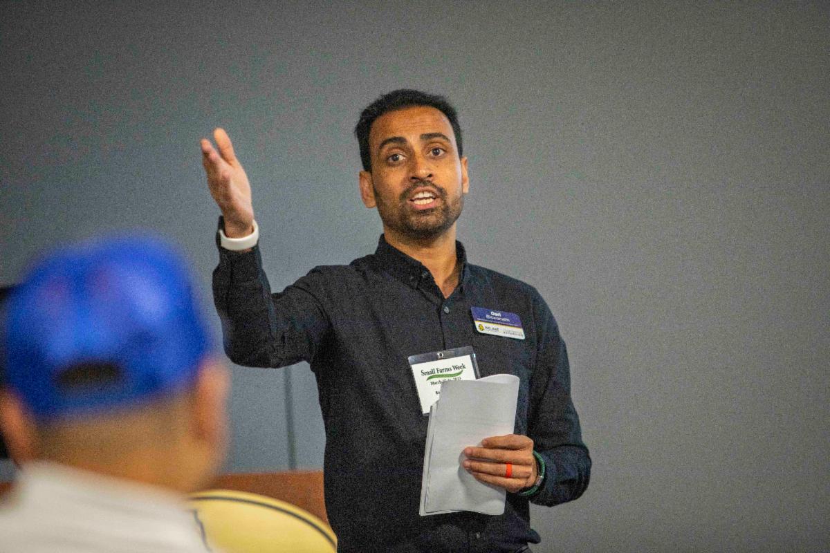 Biswinath Dari, Ph.D., talks about his work to reduce carbon emissions among vegetable growers at N.C. A&T’s Small Farms Week Educational Forum.