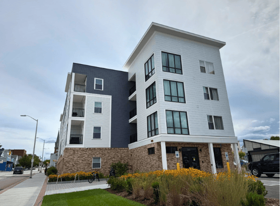 A photo of a newly build apartment building
