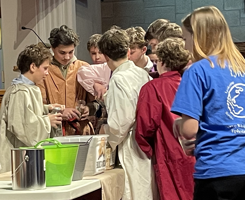8th grade gives in chapel
