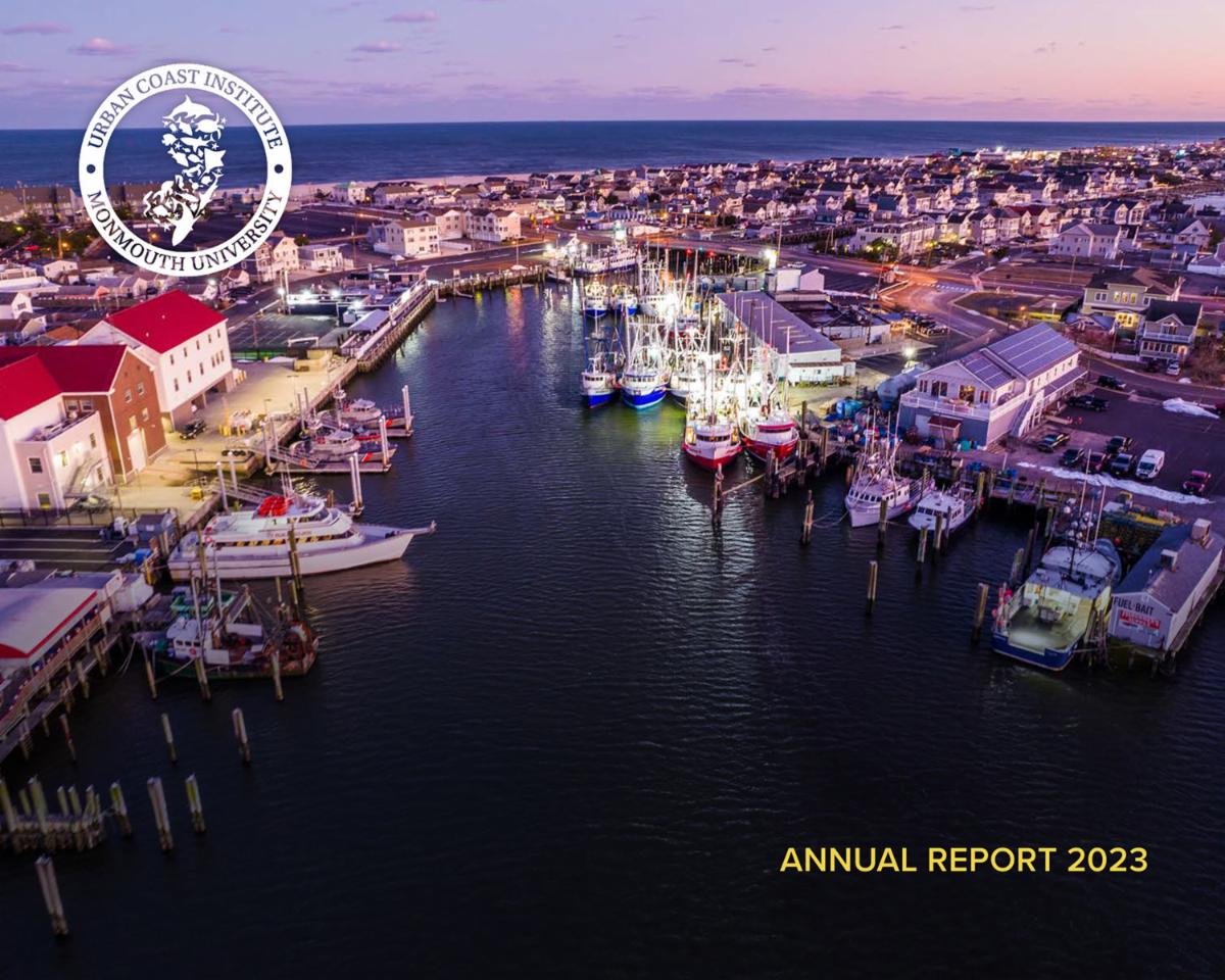The UCI 2023 Annual Report cover, showing an aerial view of a marina at sundown.