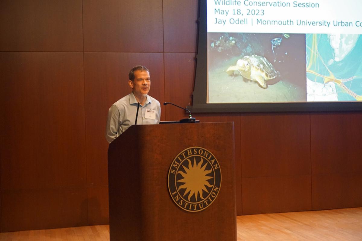 Jay Odell speaking at podium