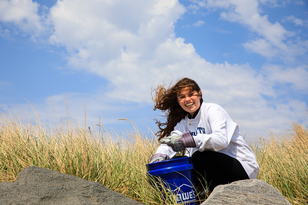Student Katie Marshall cleaning a beach in Long Branch