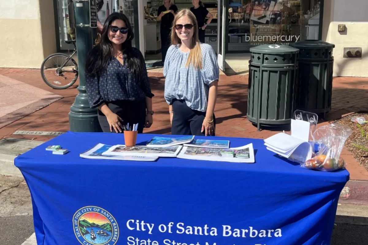 staff members at the state street master plan pop up event at the farmers market.