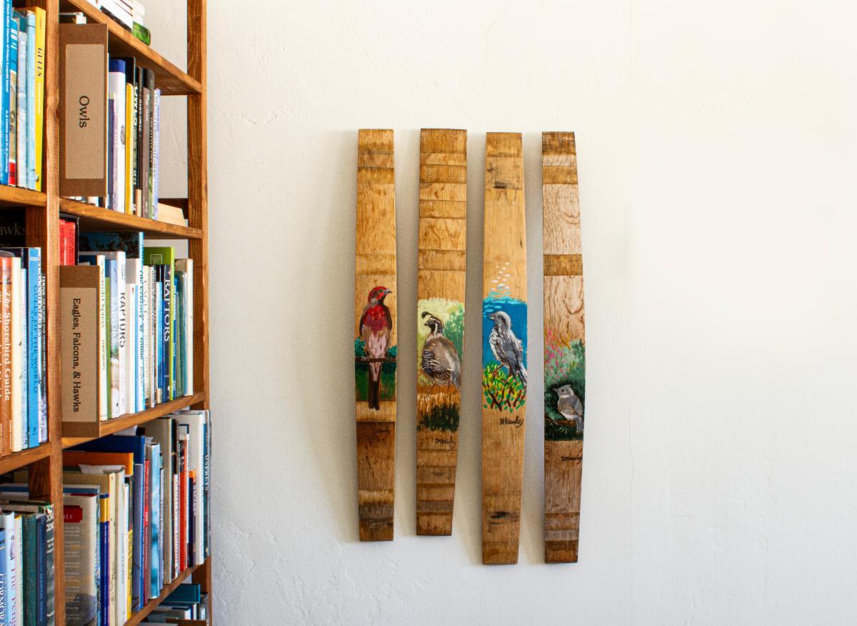local birds painted on wine staves by dana hawley