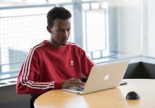 Image of NKU student on computer