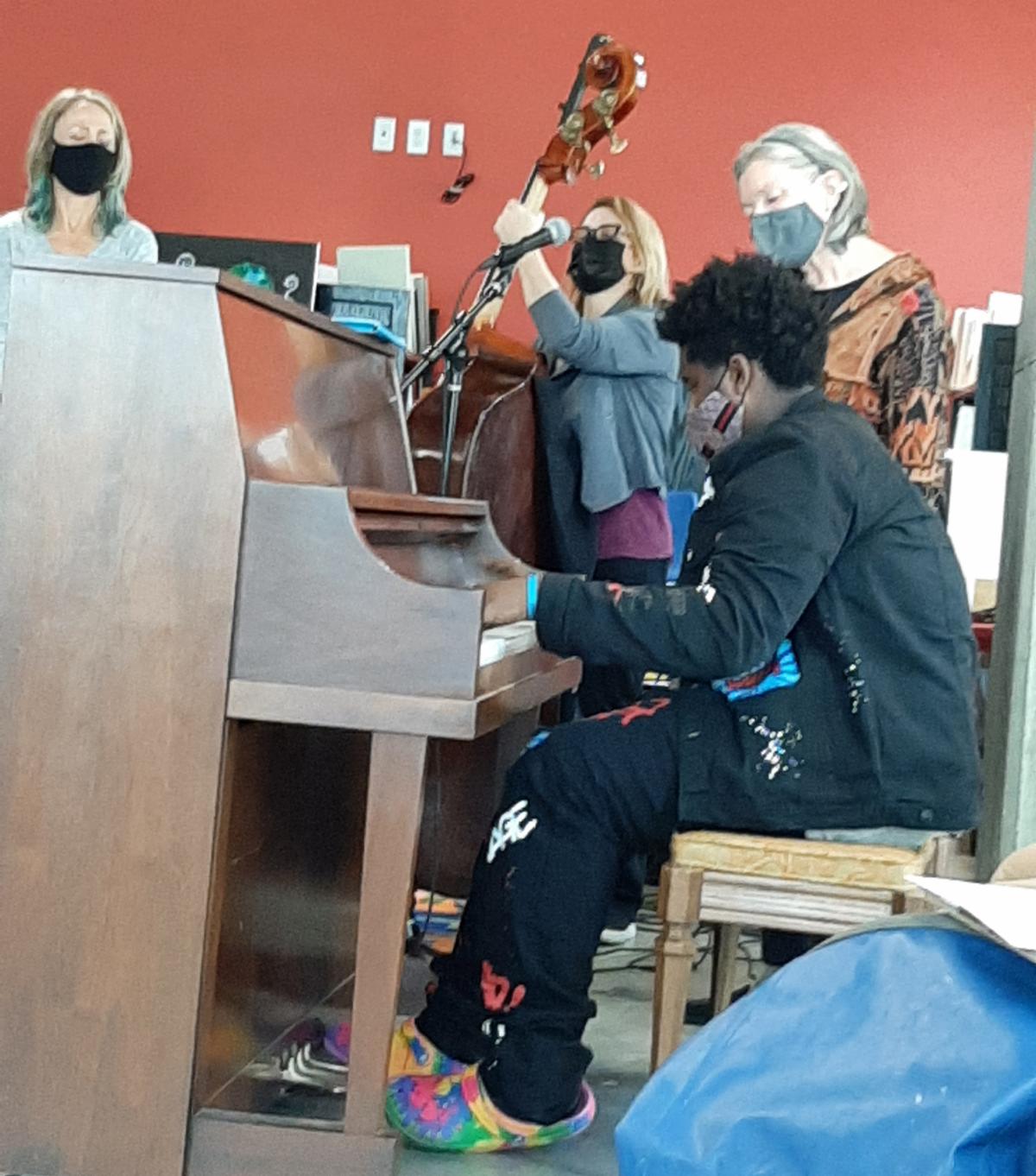 at piano cropped.jpg