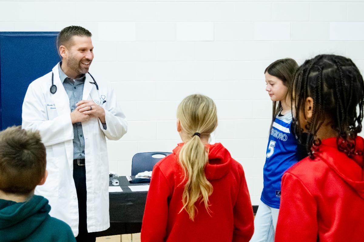Doctor speaks to students