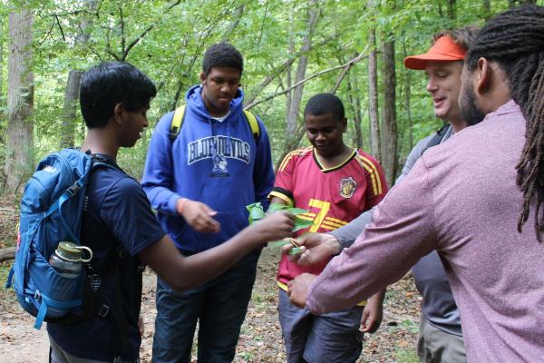 Durham teens standing in the woods