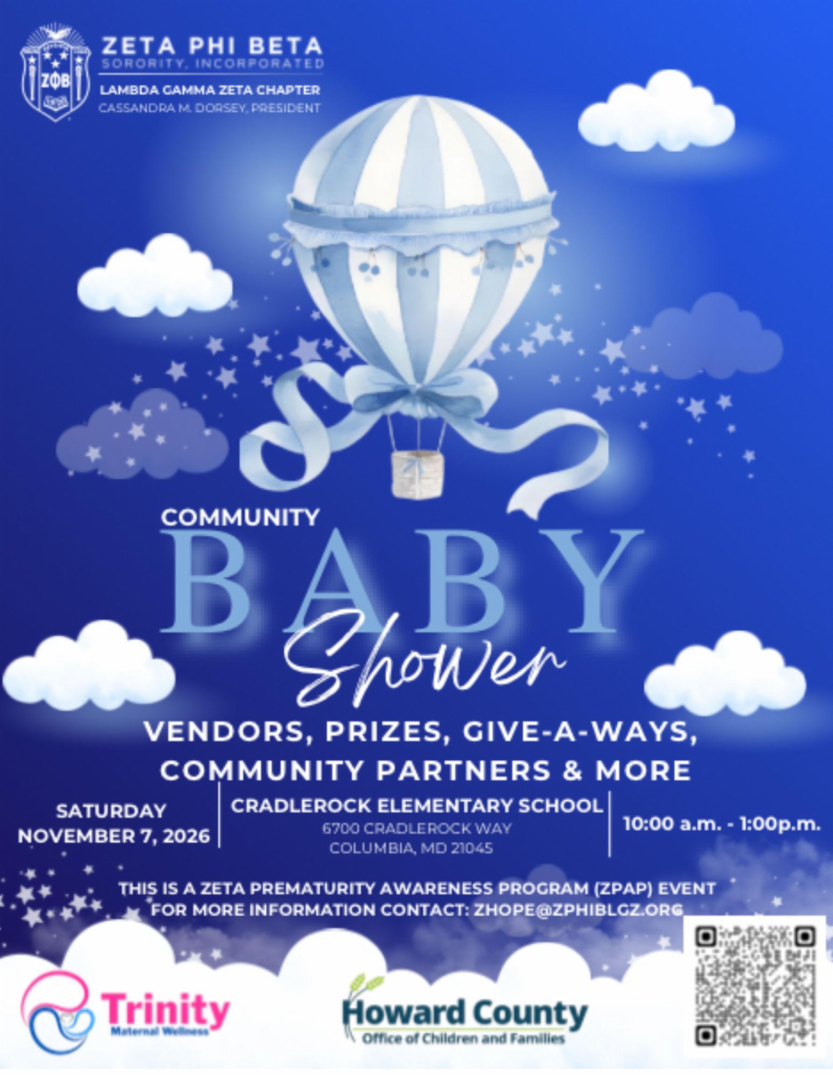 Blue flyer for Zeta Phi Beta Sorority, Incorporated, Lambda Gamma Zeta Chapter’s Community Baby Shower, featuring a whimsical hot-air balloon, clouds, and stars. The event includes vendors, prizes, giveaways, community partners, and more. It will be held Saturday, November 7, 2026, from 10:00 AM–1:00 PM at Cradlerock Elementary School, 6700 Cradlerock Way, Columbia, MD 21045. The event is part of the Zeta Prematurity Awareness Program and includes a QR code for additional information.