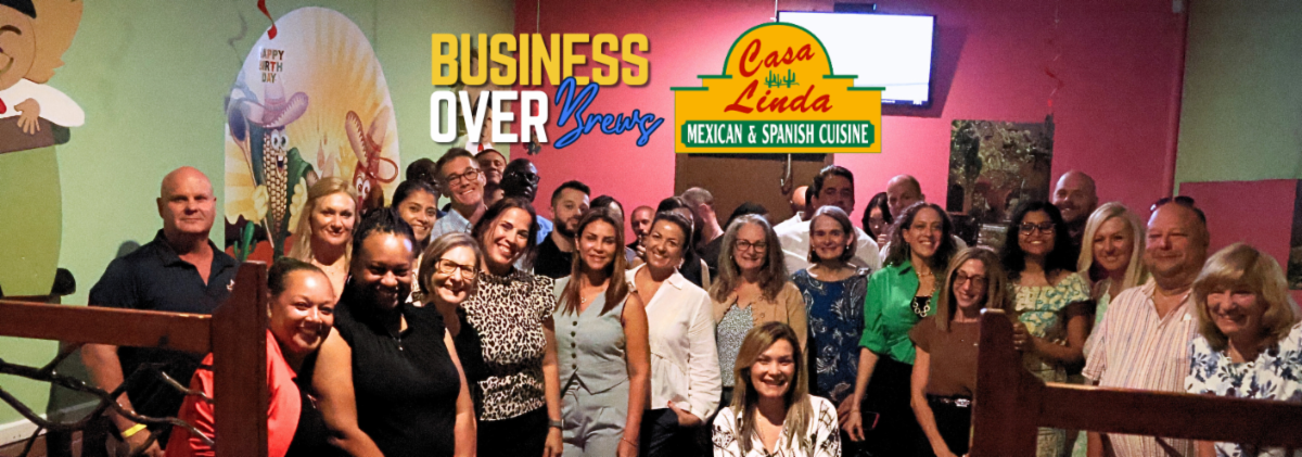 A large group of people gathers and smiles for a photo inside Casa Linda Mexican & Spanish Cuisine during a Business Over Brews event. Logos for "Business Over Brews" and "Casa Linda" appear at the top. The background features festive restaurant decor with murals, and red walls