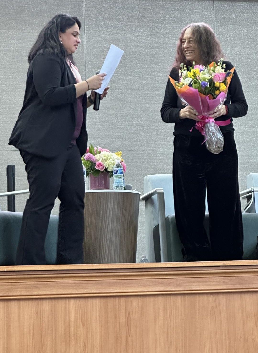 International Womens Day Retreat Keynote Dr Gilligan with flowers