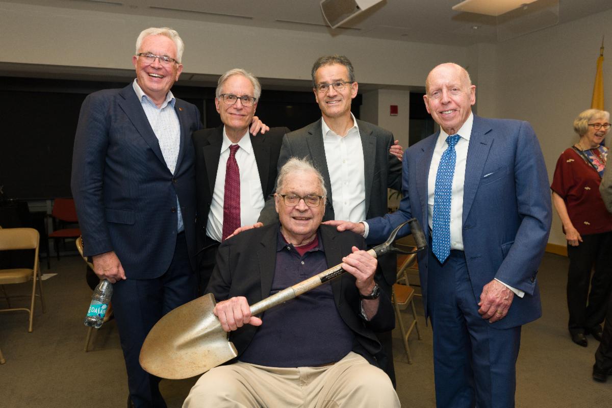 group photo with groundbreaking shovel at CHINJ 20th anniversary reception