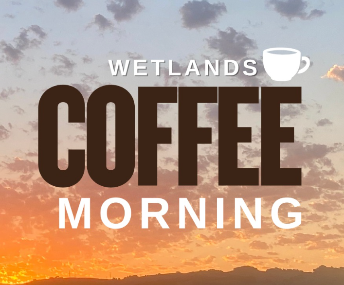 Image is of an early morning sky with clouds sprinkled across. The sun is just rising casting an orange glow across the sky. Large text overlayed reads ‘Wetland Coffee Morning.’
