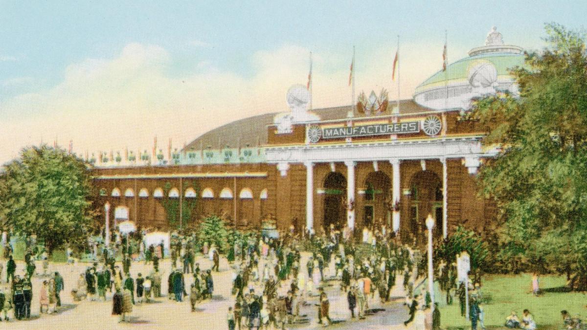 A colourized postcard of the Manufacturers' Building showing the building's main entrance.