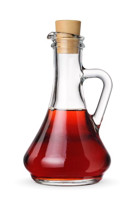 Glass decanter of red wine vinegar