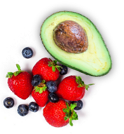 Strawberries, blueberries, and an avocado half