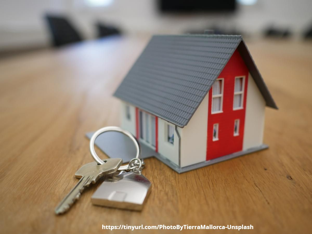 Tiny house with keys next to it