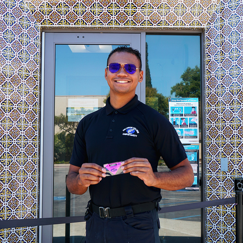 Campus Safety officer with free parking permit