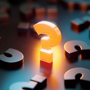 Yellow question mark glowing amid black question marks on black background