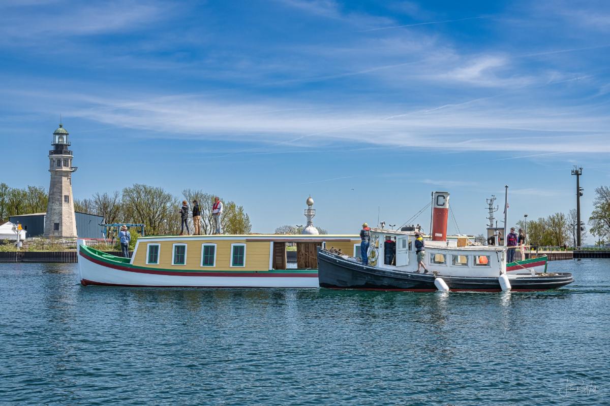 canal boat and tugboat